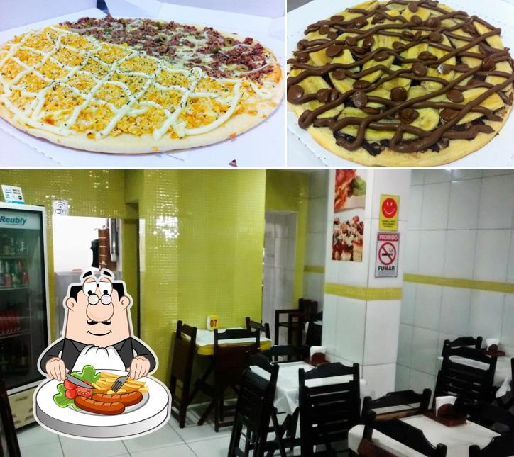 Dê uma olhada a foto apresentando comida e interior no Pizzaria Casa Massas