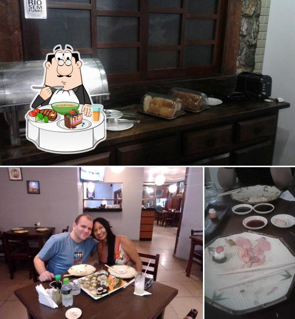 A imagem do Shogatsu Culinária Oriental’s mesa de jantar e interior