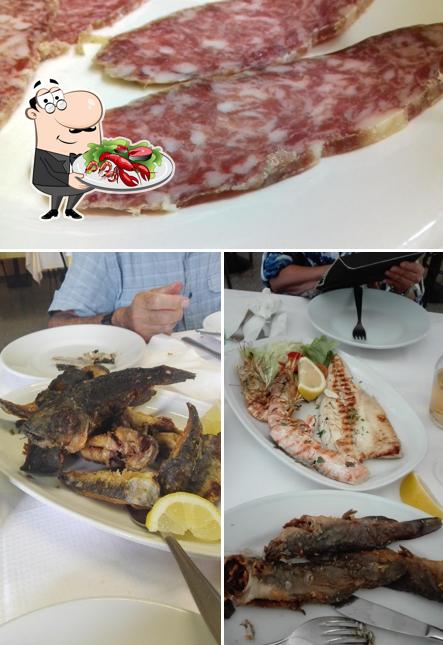 Prenditi la cucina di mare a Trattoria Del Pesce Albergo del Po Osteria al Ponte museo dei pontieri