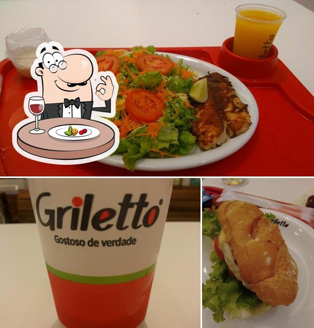 Esta é a foto apresentando comida e cerveja no Grilleto
