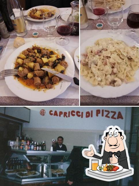 La immagine della cibo e interni di Capricci di Pizza