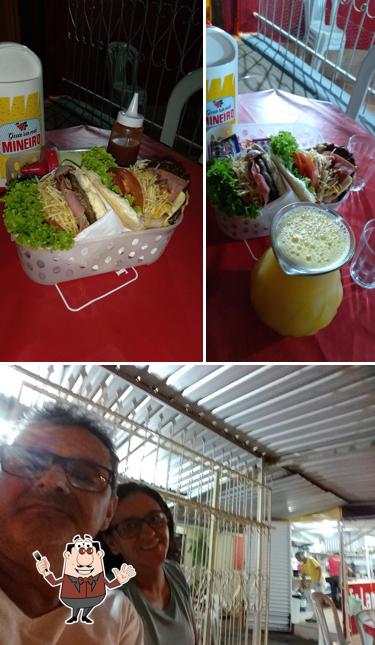 Confira a imagem apresentando comida e exterior no Ju Lanches