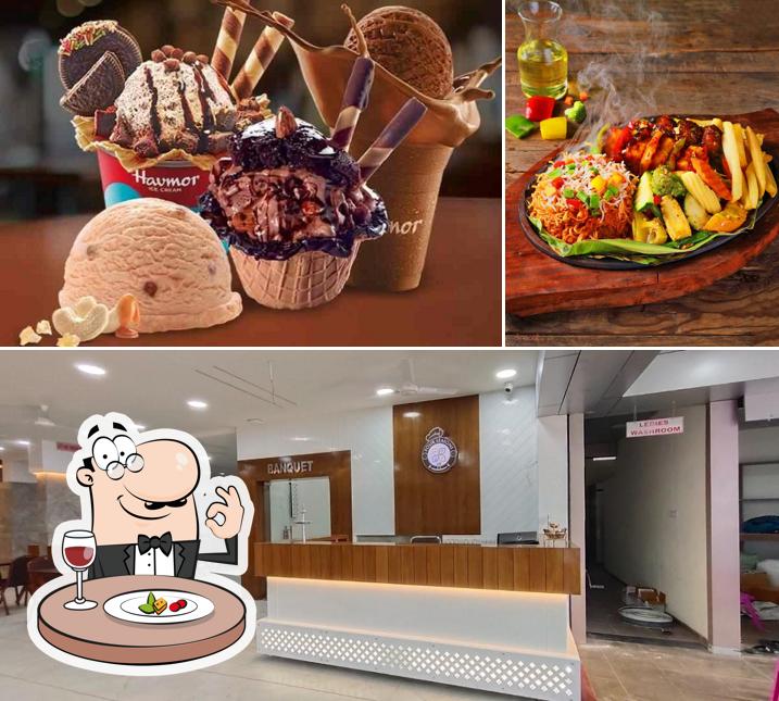 This is the picture displaying food and interior at HOTEL FOUR SEASONS LUNAWADA