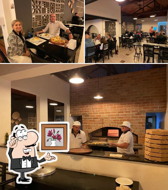 O interior do Pizzaria Familia duarte