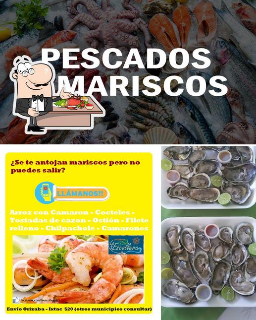 Попробуйте блюда с морепродуктами в "Mariscos La Escollera"
