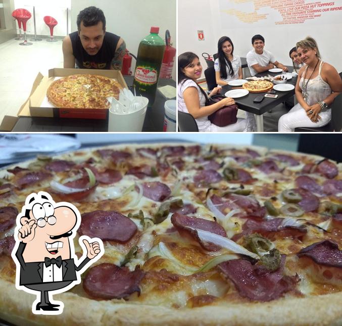 A ilustração da interior e pizza no Pizza Hut