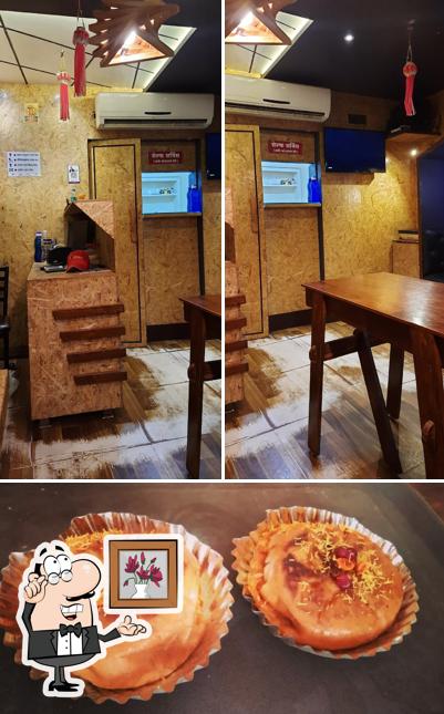 Take a look at the photo showing interior and food at Kolhapuri Dabeli Cafe