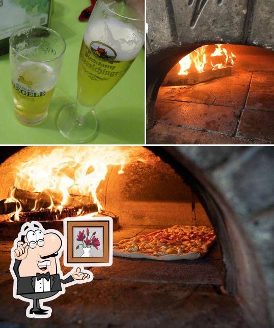 Parmi les diverses choses de la intérieur et la boisson, une personne peut trouver sur The Big PIZZA