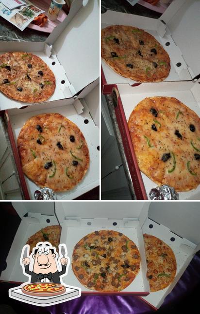 Prenez des pizzas à Snack Tanjawi