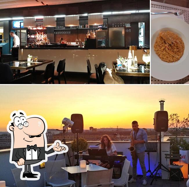Guarda la foto che raffigura la interni e cibo di Terrazza Cielo - Restaurant & Lounge Bar