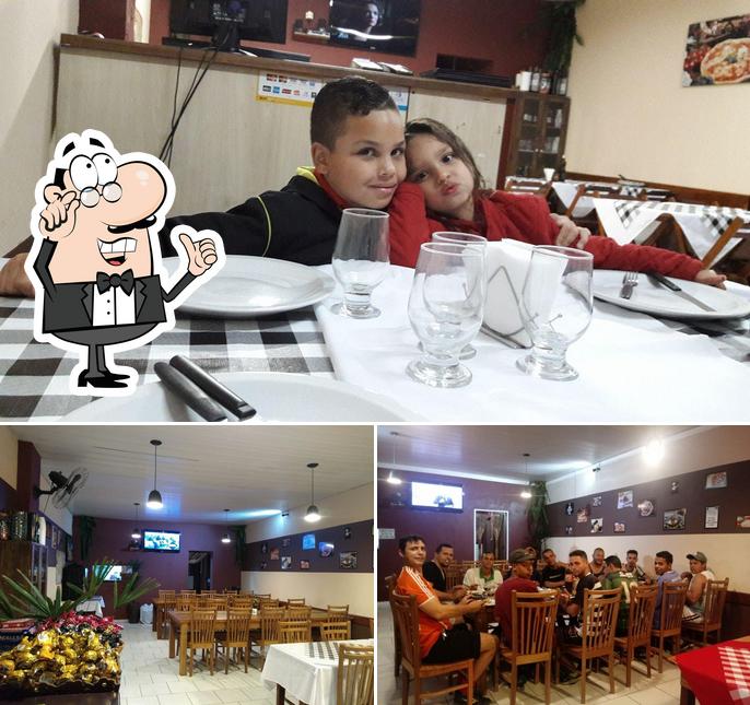 O interior do Pizzaria Victória Vinhedo