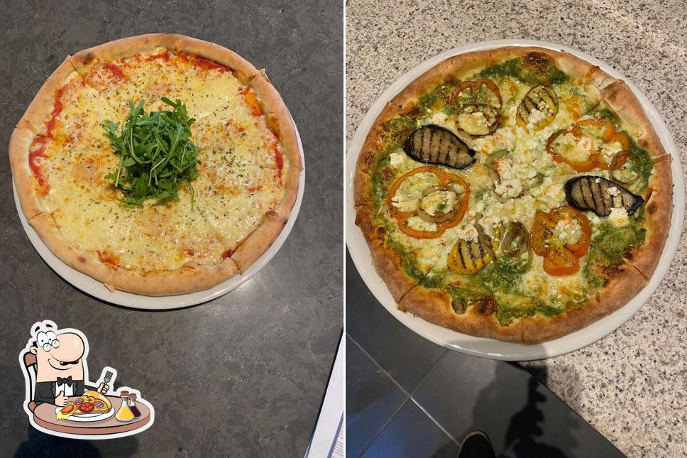 Prenez des pizzas à Taibah Restaurant / مطعم طيبة