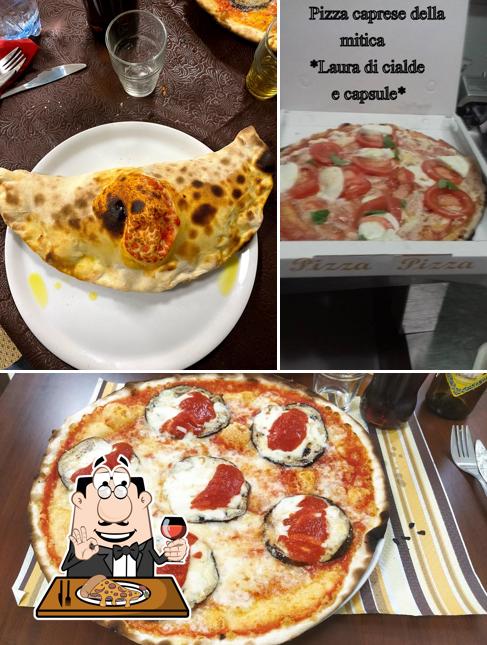 Scegli una pizza a La piazzetta pizzeria tavola calda - CHIUSO