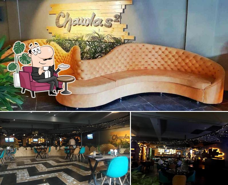 Take a seat at one of the tables at Chawla's2-