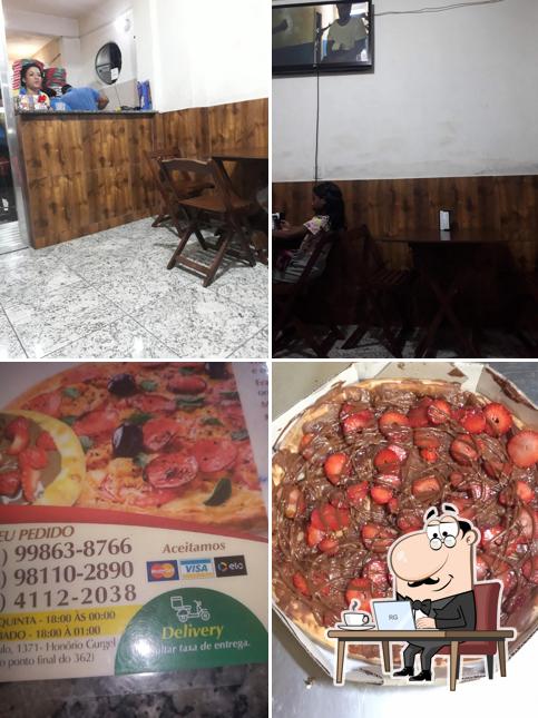 O interior do Esfiharia & Pizzaria Vegas