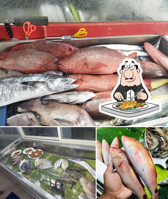 Fins & Slice, Fish Mart and Restaurant offers a selection of fish dishes