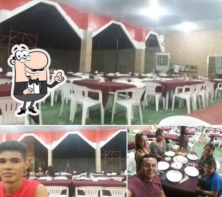 A foto da interior e mesa de jantar no Pizzaria Ki-Legal