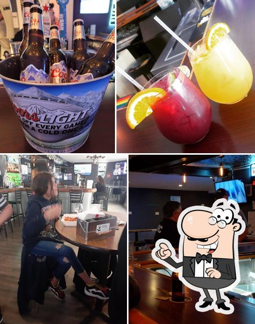This is the picture depicting interior and drink at Bad Attitude Bar & Grill