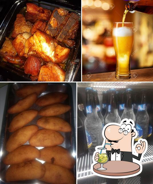 The photo of drink and food at Bar do Telvino