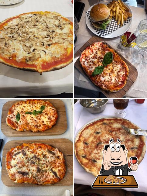 A Ristorante Pizzeria Popolo Caffè, puoi ordinare una bella pizza