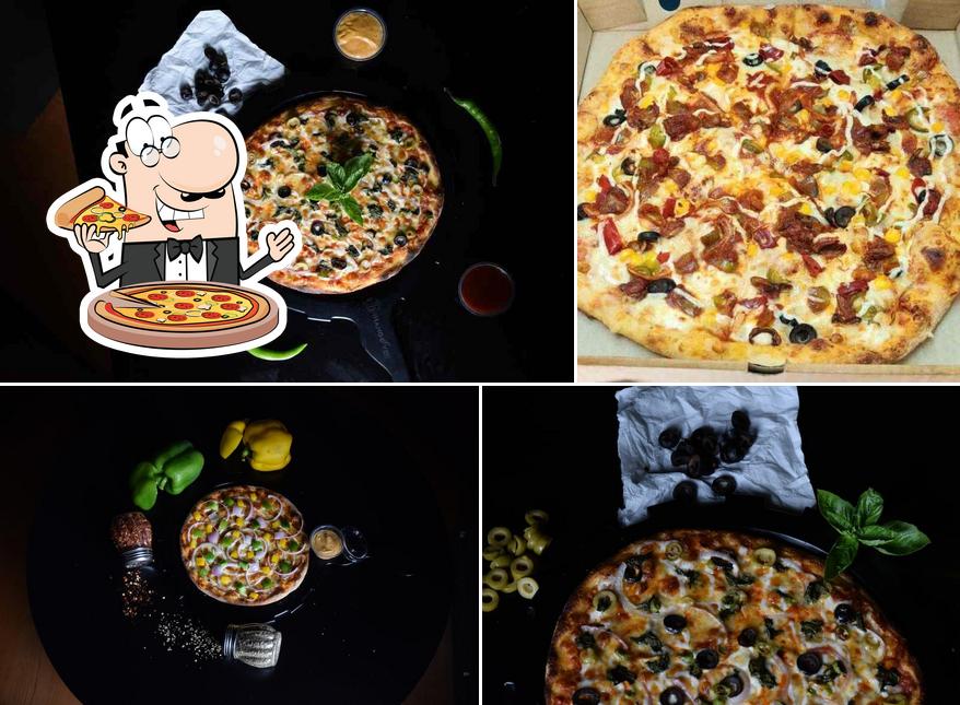 Get pizza at Yummy Divine Pizza & Kaffee Bar