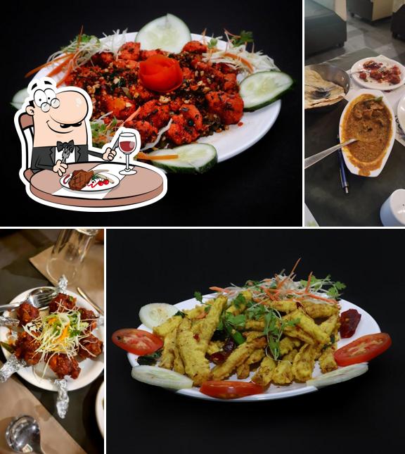 Order meat dishes at The Mint Multicuisine Restaurant