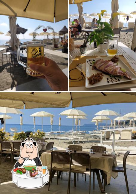 Aluha Ristorante sul mare si caratterizza per la tavolo da pranzo e birra