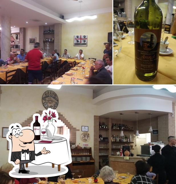 Guarda la foto che raffigura la tavolo da pranzo e bevanda di Ristorante Pizzeria Arena