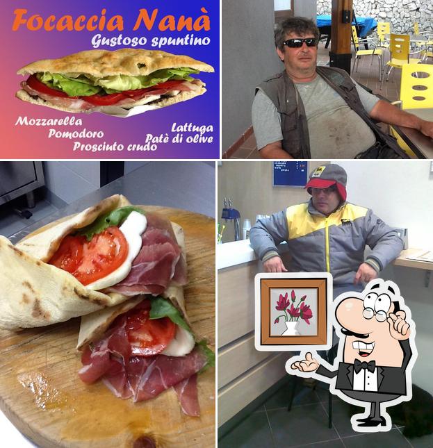 Questa è la foto che mostra la interni e cibo di Eni Cafè