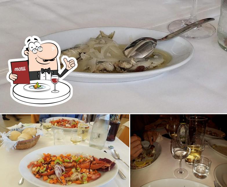 Questa è la immagine che presenta la cibo e alcol di Trattoria Da Ugo