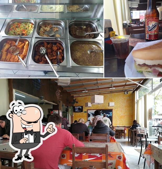 The photo of Gino Restaurante & Gastronomia’s interior and beer