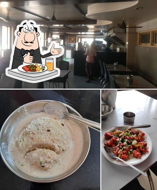 The photo of food and interior at Hotel Renuka