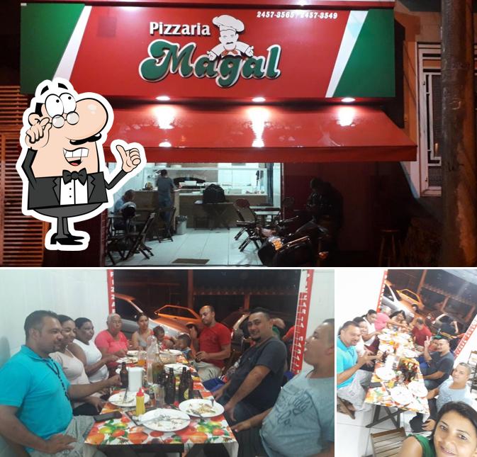 O interior do Pizzaria Magal