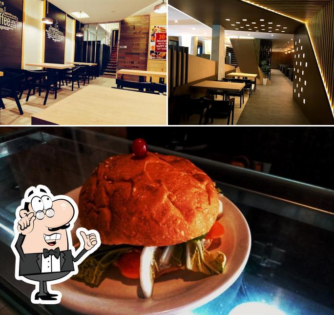 Among different things one can find interior and burger at K.R. Bakery & Restaurant manjeri Thurakkal