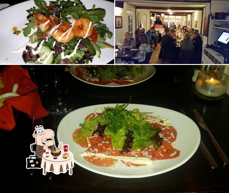 Observa las fotos que hay de comida y comedor en Restaurant Scampi