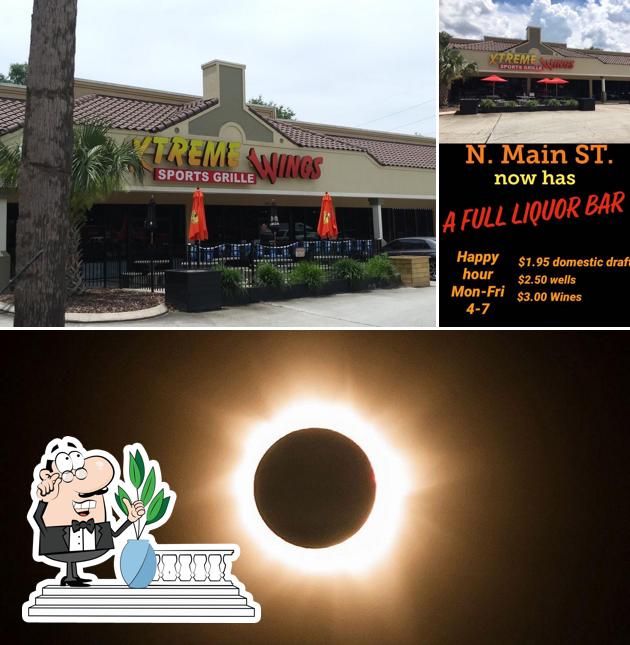Xtreme Wings Sports Bar and Grille Main St, 11565 N Main St Unit 109