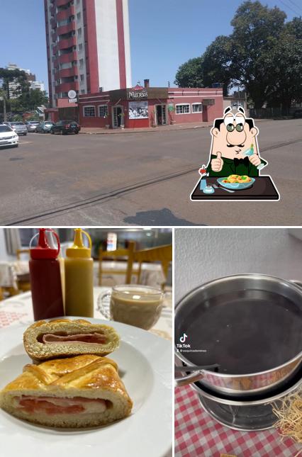 A imagem da comida e exterior no Restaurante Esquina de Minas