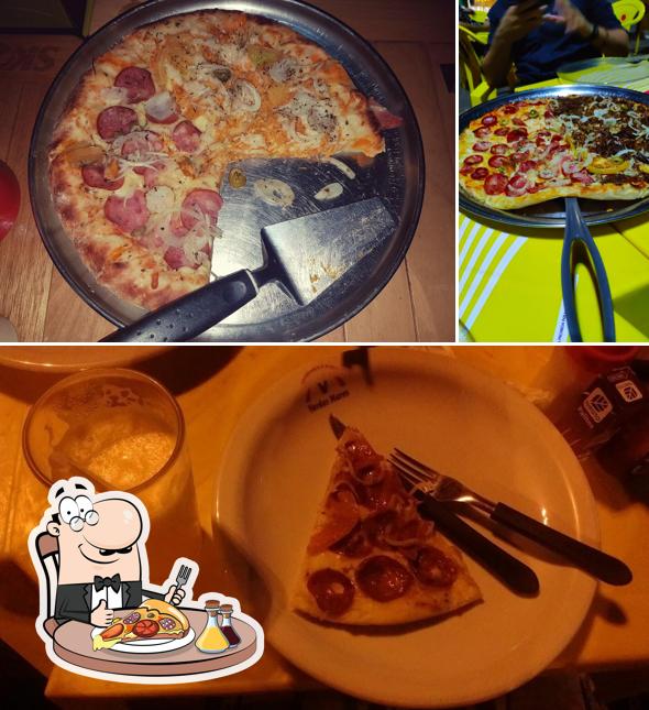 Experimente pizza no Pizzaria e Churrascaria Verdes Mares