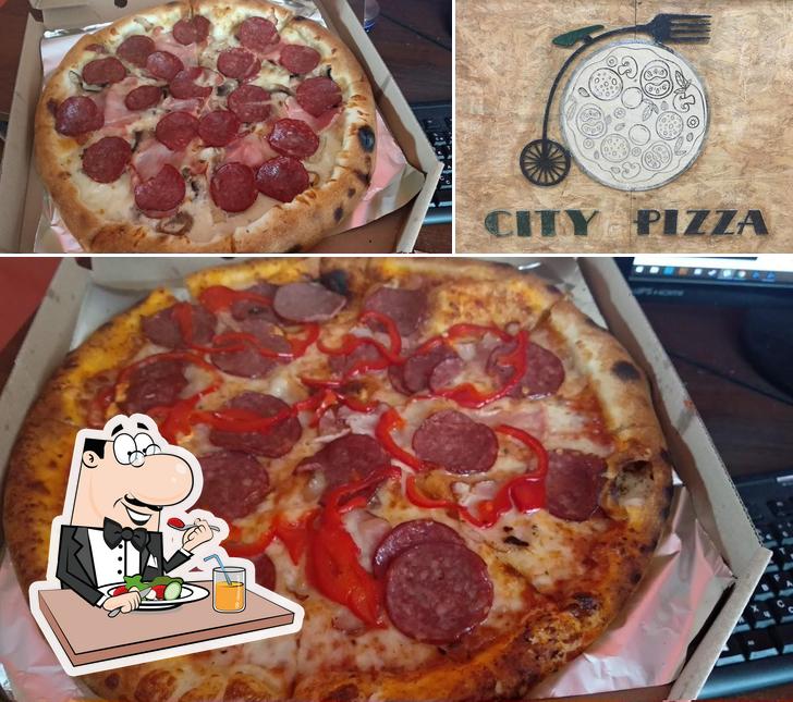 Фотография, на которой видны еда и внешнее оформление в City Pizza
