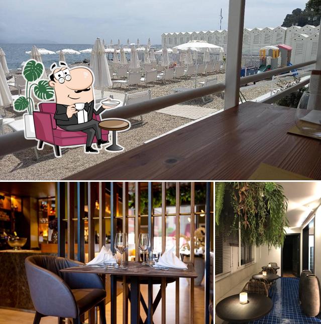 Questa è la foto che presenta la interni e bevanda di Oasi al Mare Beach Club