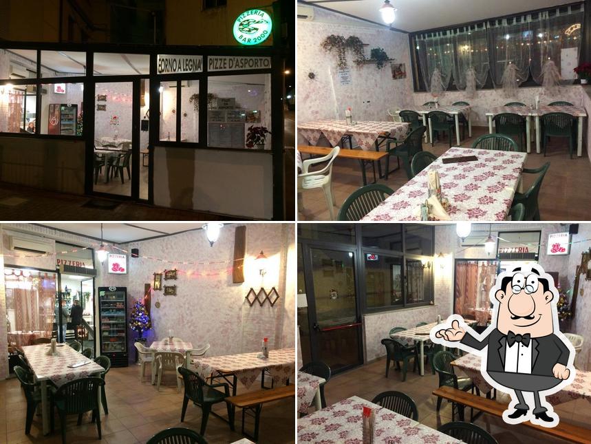 Dai un'occhiata agli interni di Pizzeria 2000