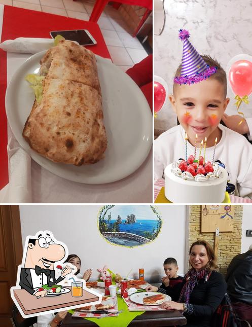 Questa è la immagine che presenta la cibo e tavolo da pranzo di Rusticone Di Iodice Mario