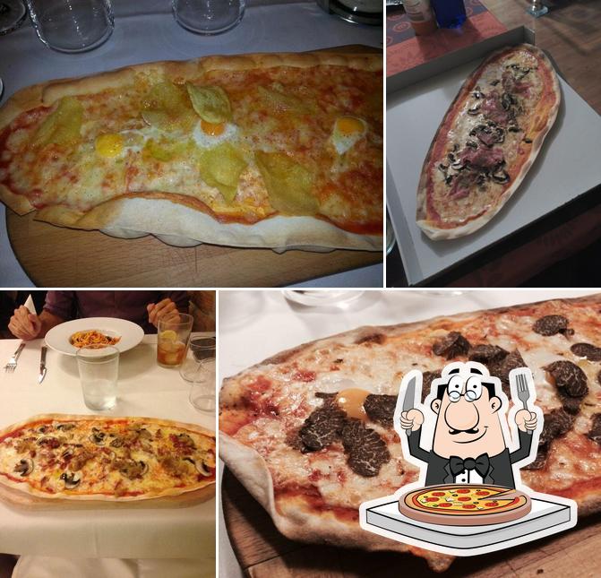 Get pizza at Restaurante Gordo y Flaco