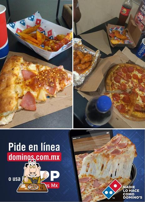 Try out pizza at Domino's Playa Del Carmen