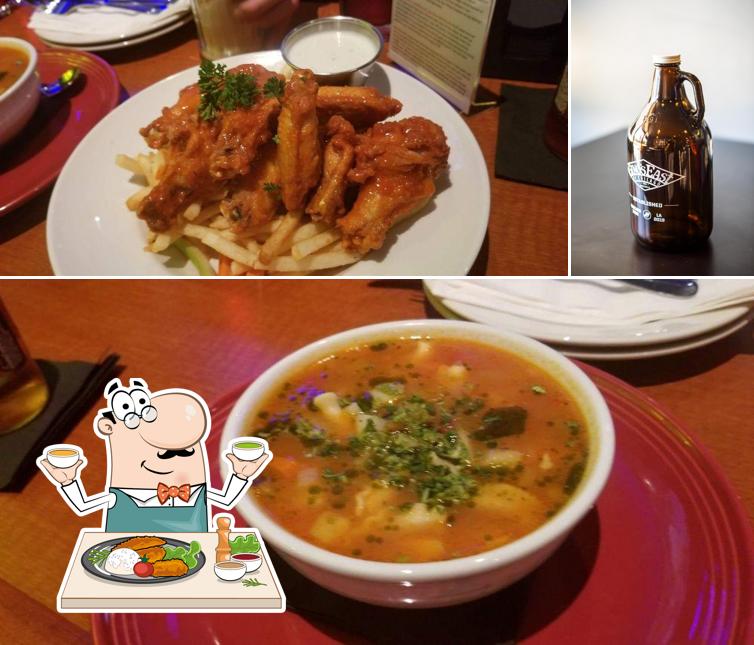 Take a look at the picture showing food and beer at Gino's East of Chicago