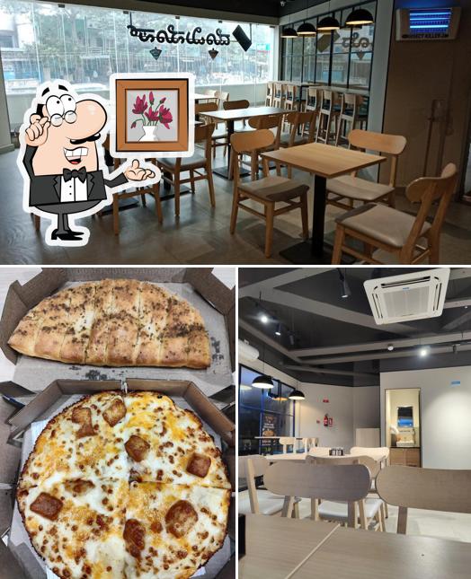 Domino's Pizza is distinguished by interior and pizza