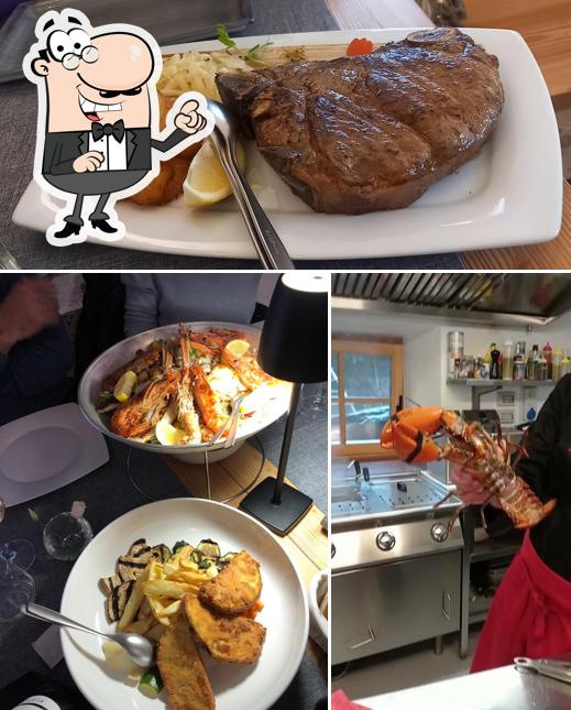 La foto di interni e bevanda da Ristorante Domu Mea