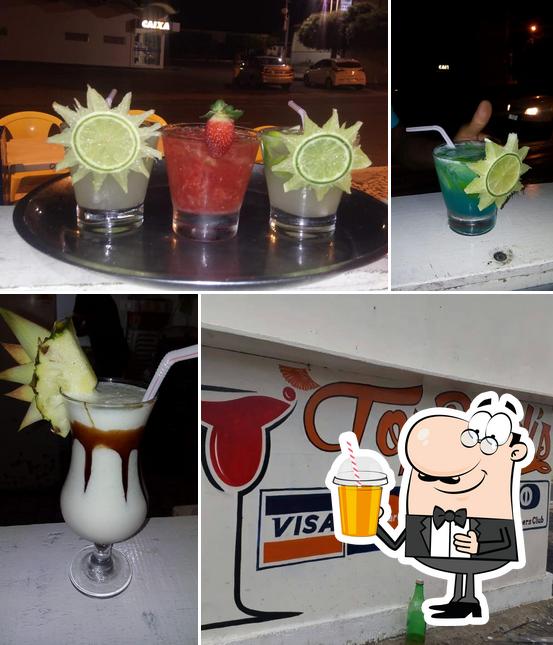 Enjoy a beverage at Top Drinks