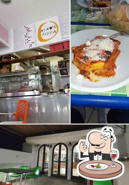 The photo of food and interior at Nino's Pizza