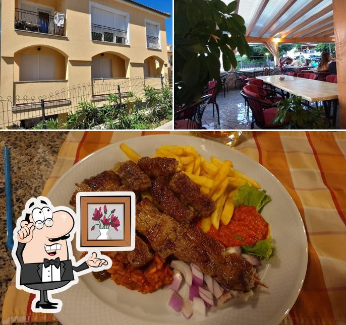 Guarda la foto che mostra la interni e cibo di Pansion Dragica